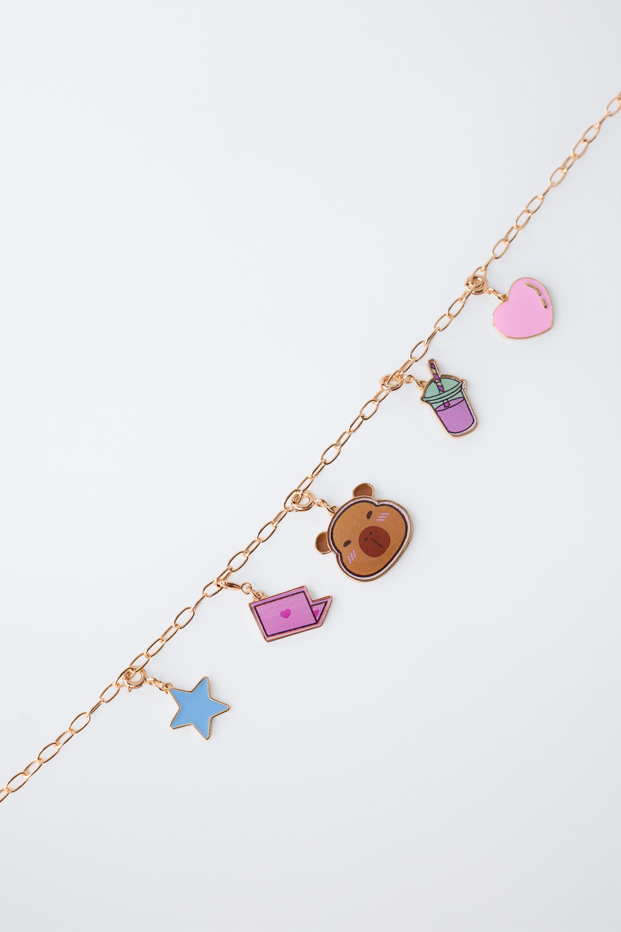 INTERCHANGEABLE MULTICHARM NECKLACE